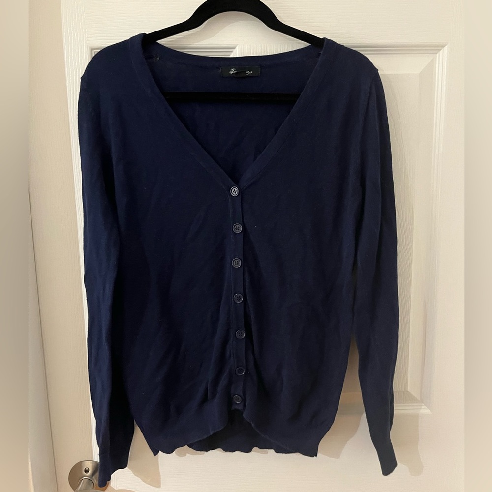 Forever 21 navy blue button down sweater, size L. Buttons down front.